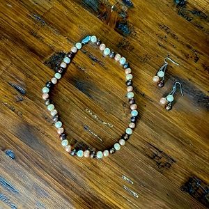 Pretty freshwater pearls. Necklace and dangling earrings. Necklace is 18 in